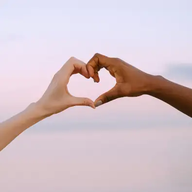 Two hands making a heart